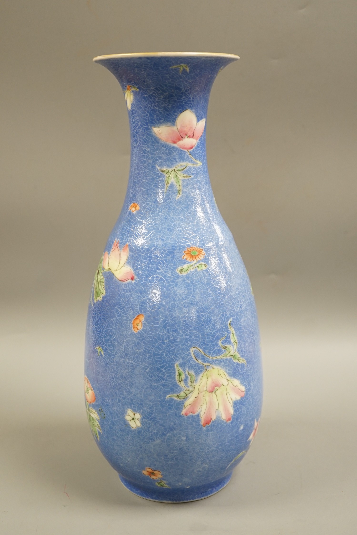 A Chinese sgraffito enamelled porcelain four flowers vase, Qianlong seal mark but Republic period, 35.5cm